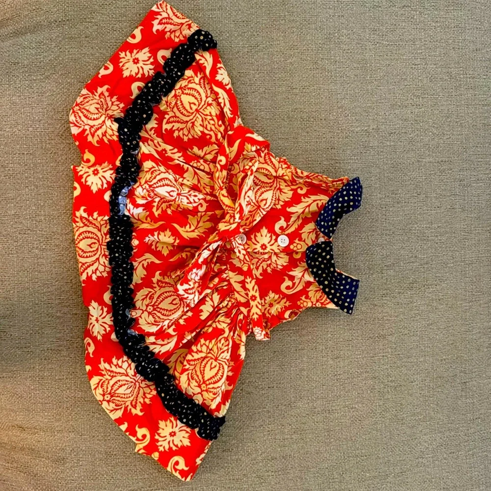 Blue and orange pernickety top and bottom set.
